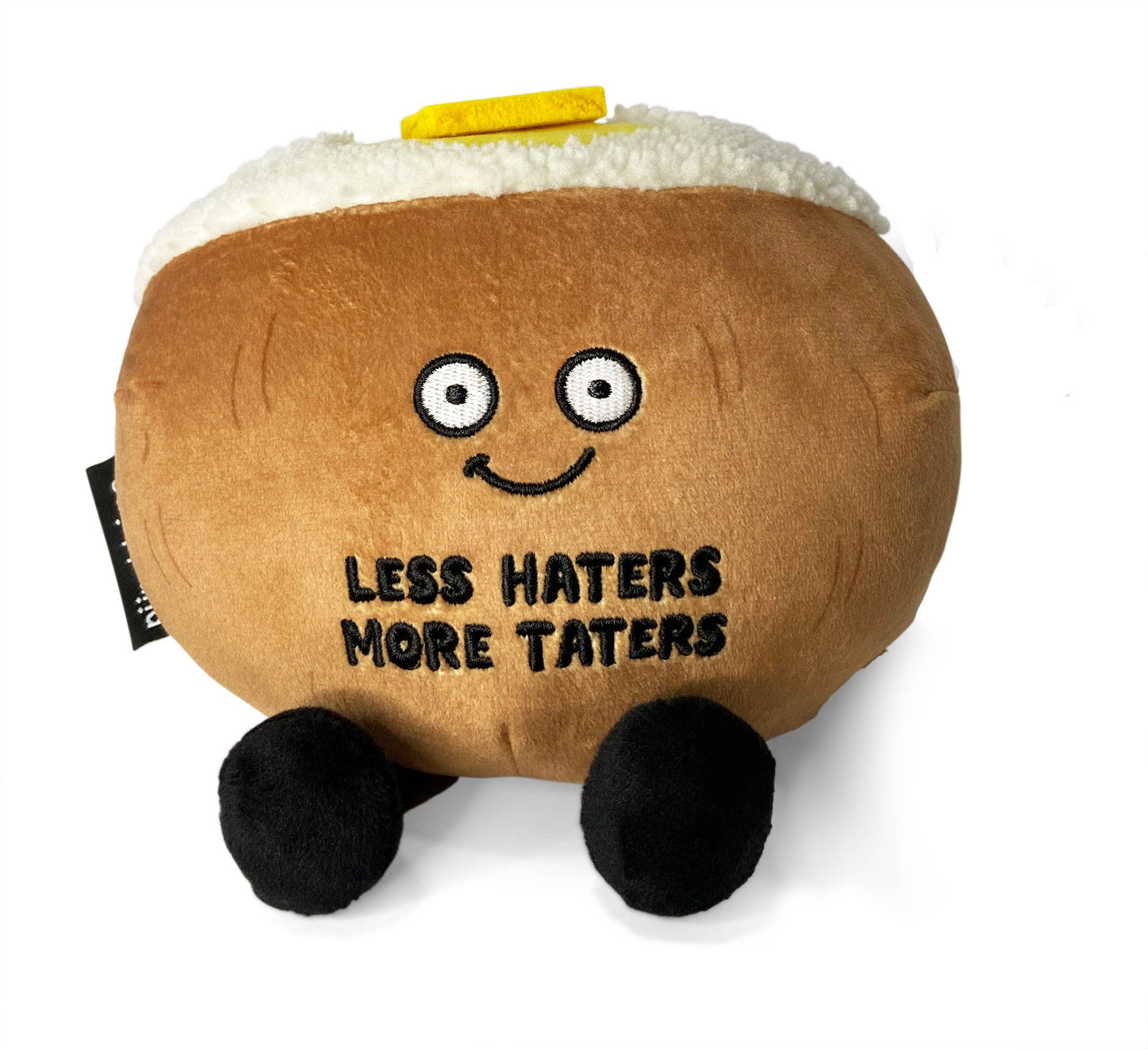Baked potato plush toy that reads "Less Haters More Taters"