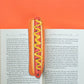 Bookmark that looks like a hotdog with mustard