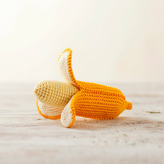 Partially peeled crocheted banana