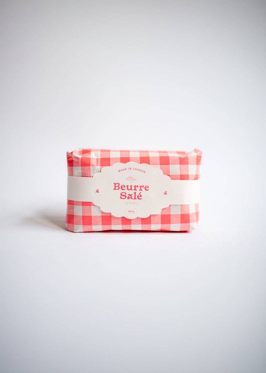 Salted butter candle in red gingham packaging 