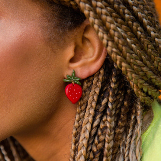 strawberry earrings worn on model 