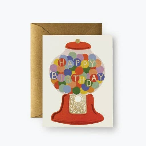 Gumball machine filled with colorful gumballs and text on it reads "happy birthday" 