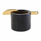 Black marble dip cup with a brass spreading knife 