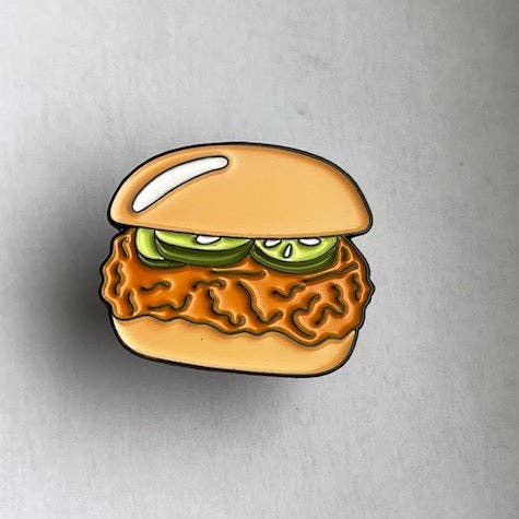 Chicken sandwich lapel pin with 3 pickles.