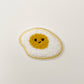 Egg Chenille patch with happy face. 
