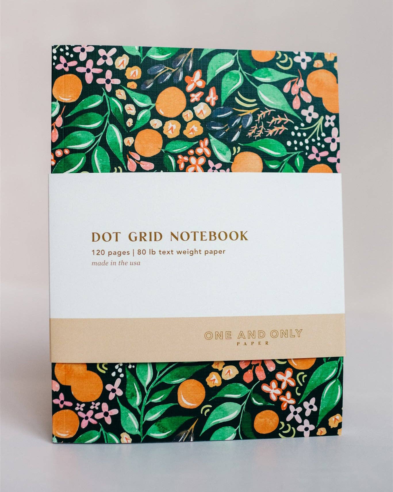 Soft cover notebook with dot grid pages -- cover design has oranges and foliage on it 