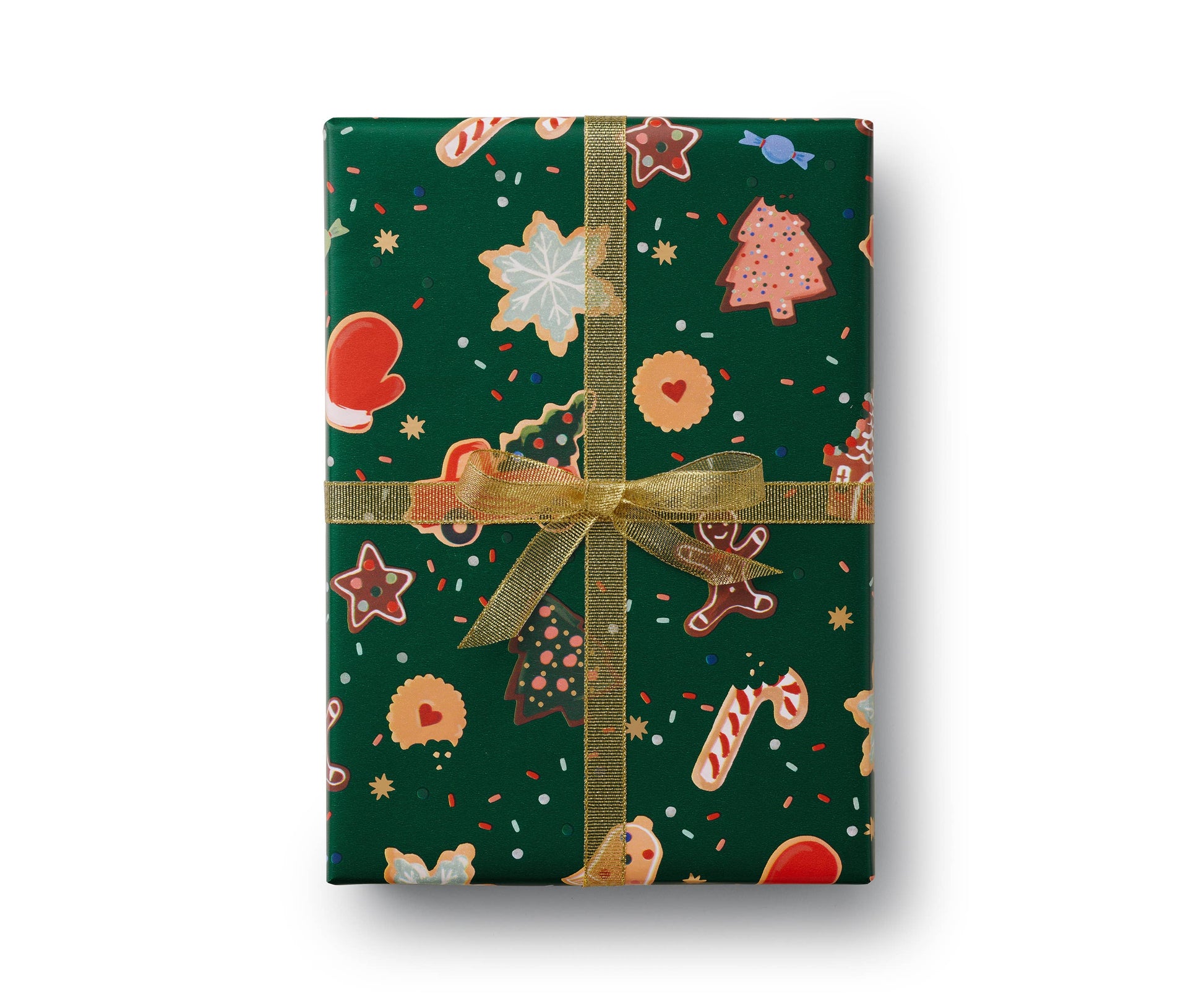 Gift wrapping paper with illustration of Christmas cookies in assorted shapes (gingerbread people, candycanes, etc) on green background. Shown with sparkley gold ribbon.