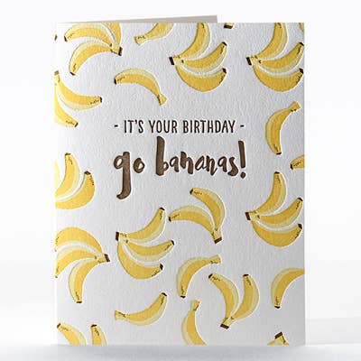 Letterpress card with bananas all over the front. It reads "It's your birthday- go bananas!"