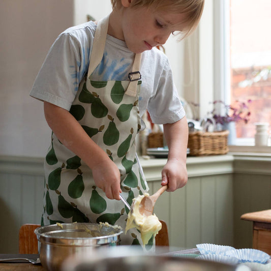 Children sized apron with green pear print all over