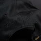 Embroidery on back of hat reads "Love & Victory", the brand's name 