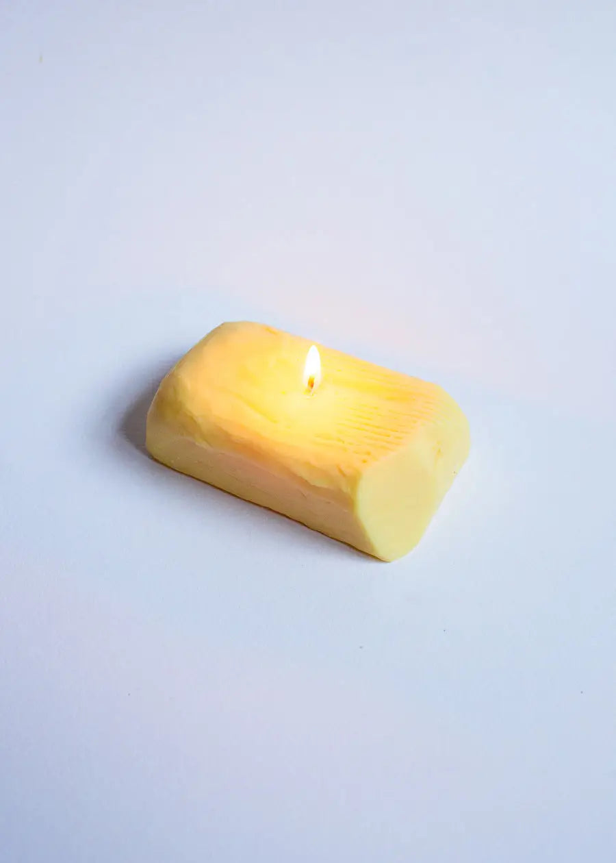 Lit butter candle 
