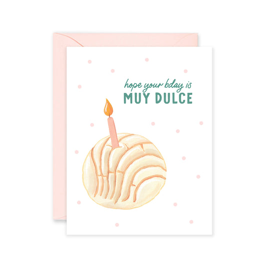 Greeting card with a pan dulce with a candle in it. It reads, "hope your bday is MUY DULCE"