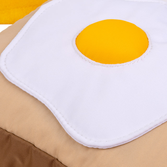 close up of squishy egg applique on toast bag 