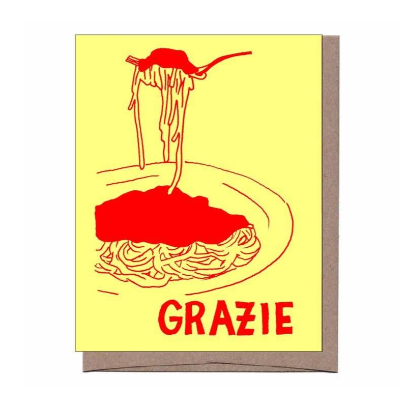 Greeting card with a bowl of spaghetti and a fork lifting the noodles in the air. Yellow card with red print. Card has the word GRAZIE.