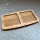 Wooden tray with two side by side, separated compartments. 