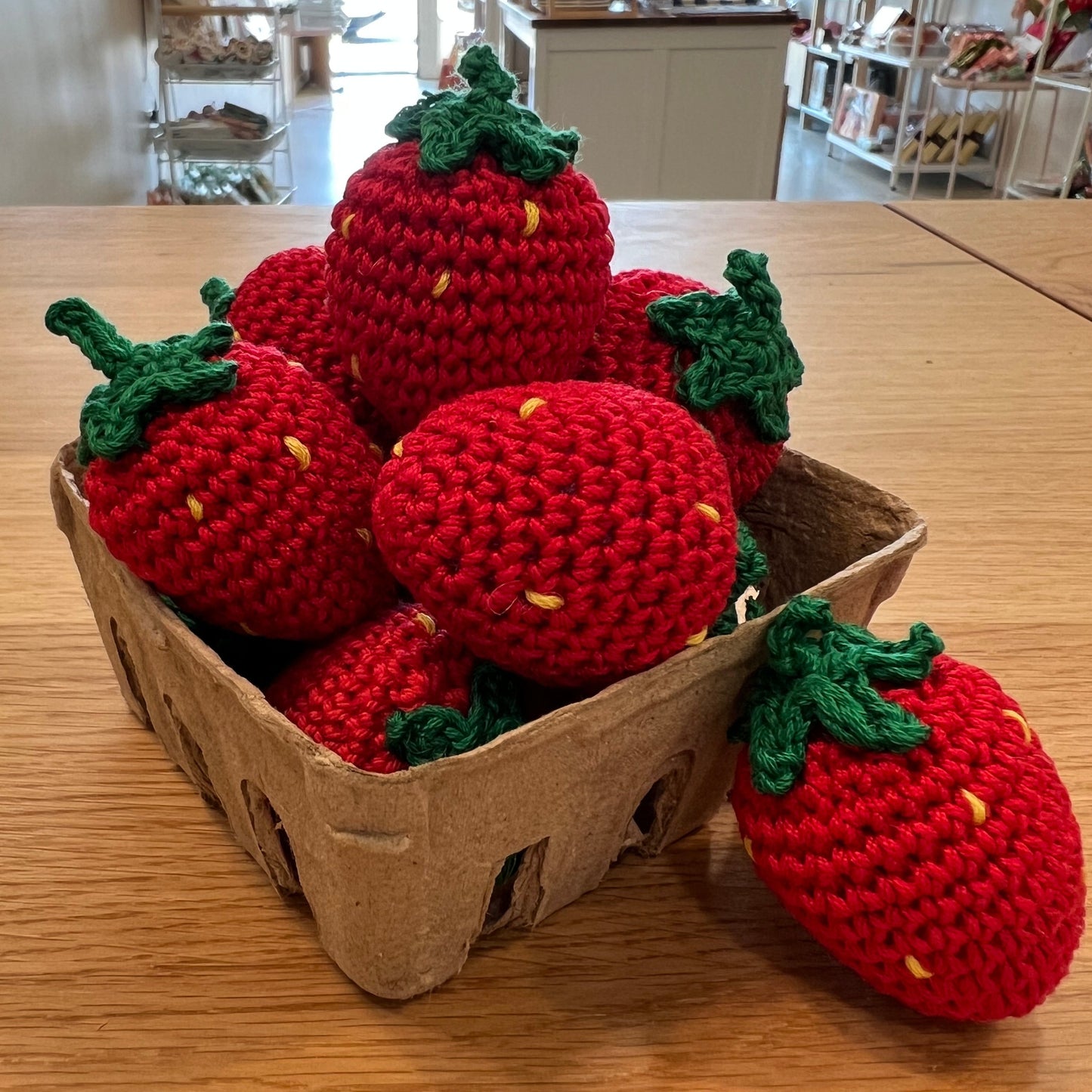 crocheted strawberries in a berry basket 