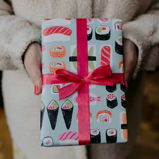 wrapping paper with different sushi on it 