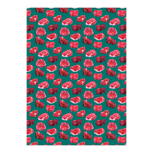 Sheet of wrapping paper with raw steaks on it 