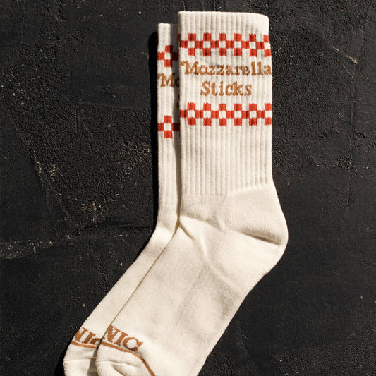 Cream colored socks -- on ribbed, ankle part it reads "Mozzarella Sticks" in between red and cream checker print 