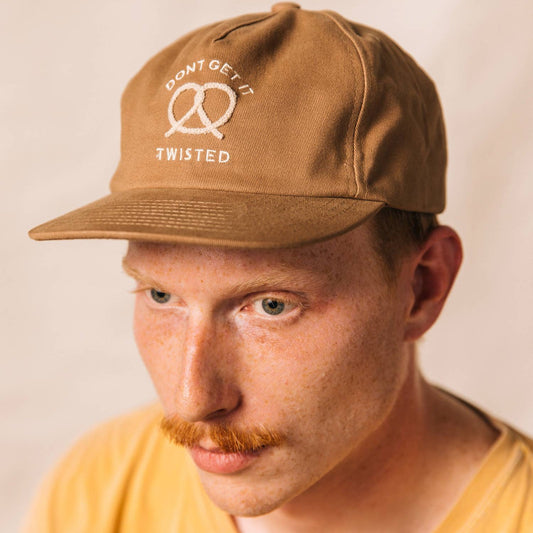 Pretzel cap on model's head 