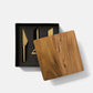 Set of 3 brass colored, stainless steel cheese knives in melamine & acacia wood case 