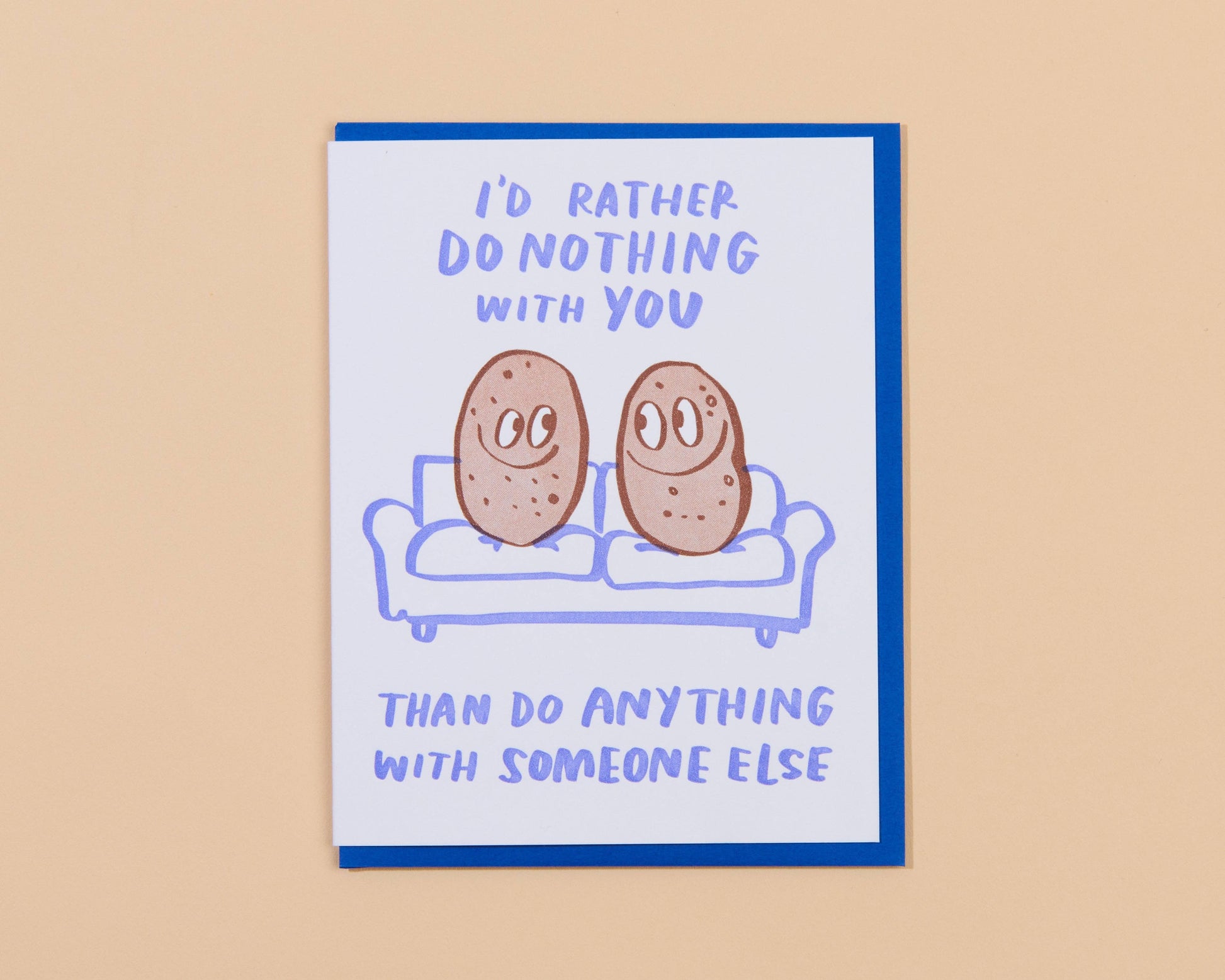 Greeting card that reads "I'd rather do nothing with you than do anything with someone else" with two potatoes on a couch