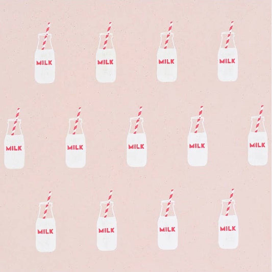 Milk bottle gift wrap with bottles 3/4 full with milk. The bottles say milk and there is a red and white straw sticking out of the bottle. Pink background.