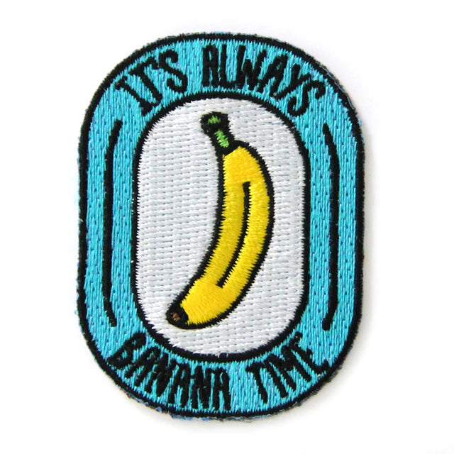 Oval patch that is blue on the outside and in the center has a banana. Around the edges it reads "It's always banana time" 