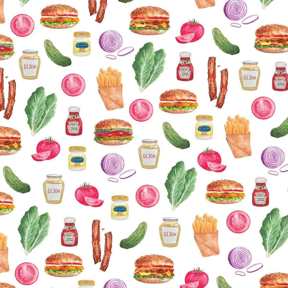 Kitchen towel with burgers + condiments as the design print 