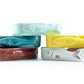 ceramic dish for sardine tins in 5 different colors -- turquoise, light blue, yellow, white and red 