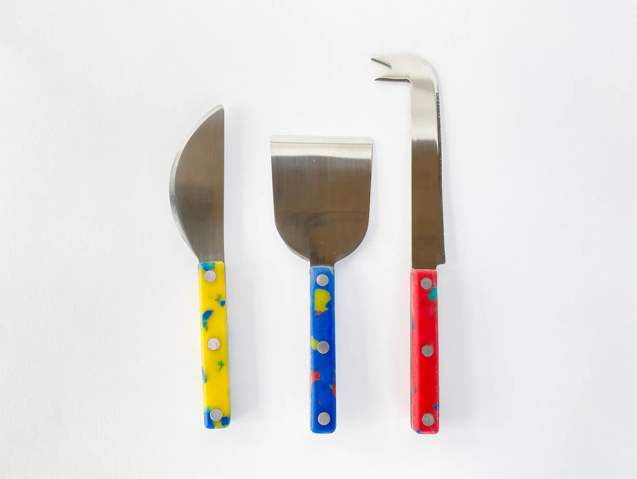 Set of 3 cheese knives, each with a different colored handle -- yellow (soft cheese), blue (semi-soft cheese) and red (hard cheese) 