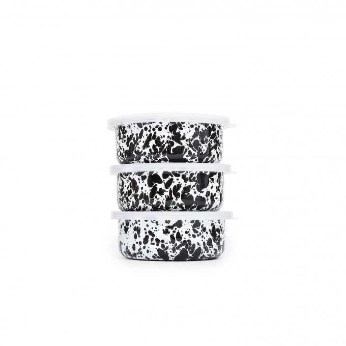 Stack of 3 enamel storage bowls with lids. Black splatter pattern throughout. 