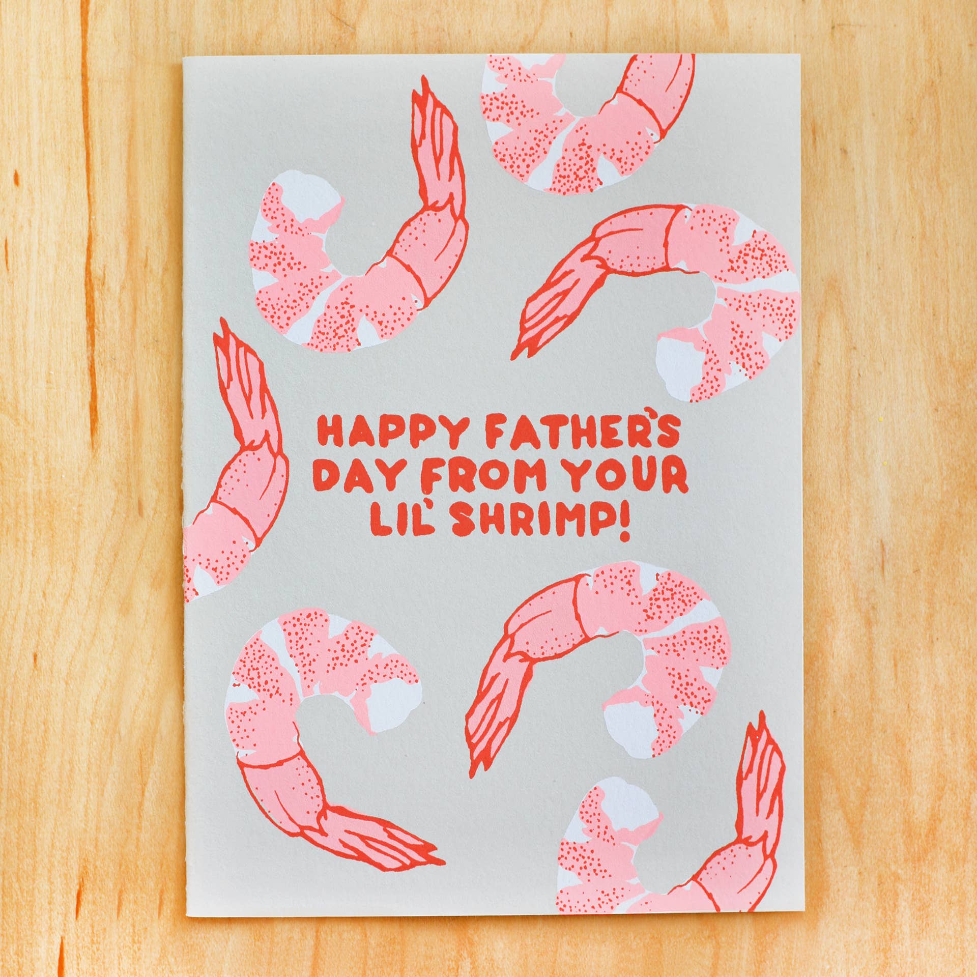 Father's Day card that reads "Happy Father's Day from your lil' shrimp!" and has shrimp all over it