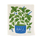 Sponge towel with printed illustration of basil plant with blue flowers, in blue pot labeled "Basil."