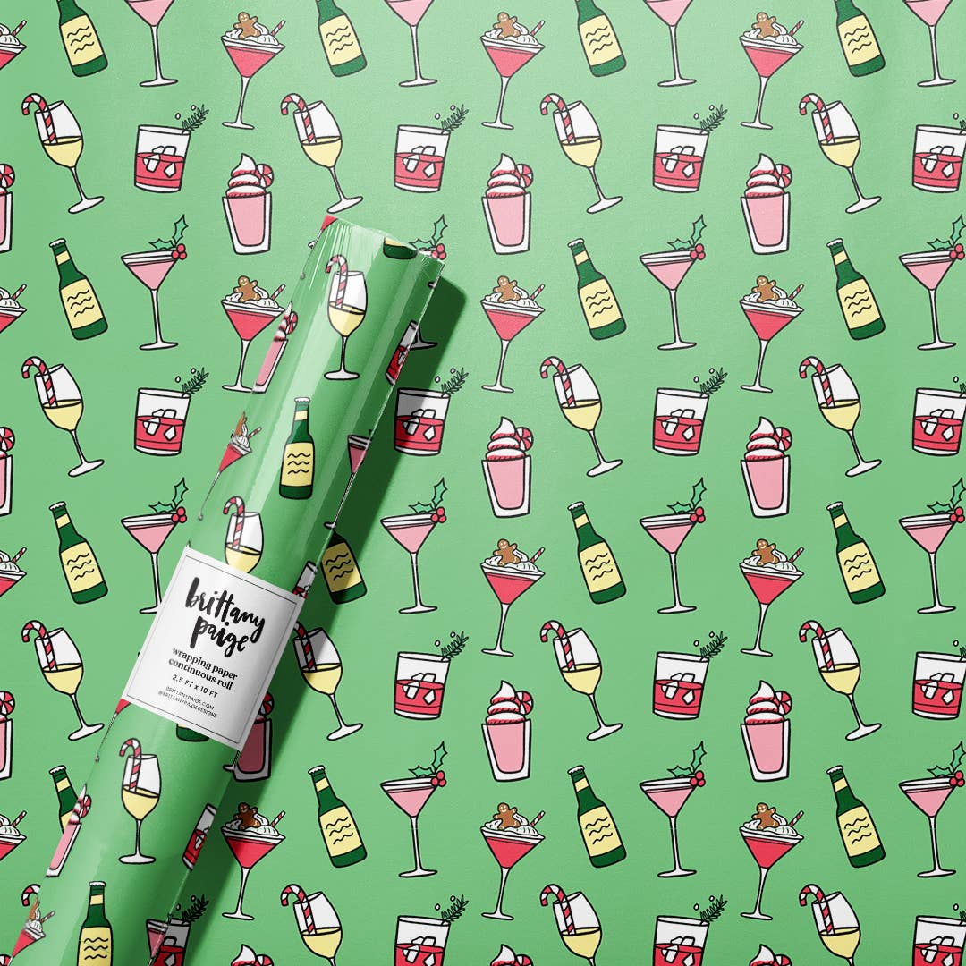Green gift wrap roll with various cocktail drinks all over it 