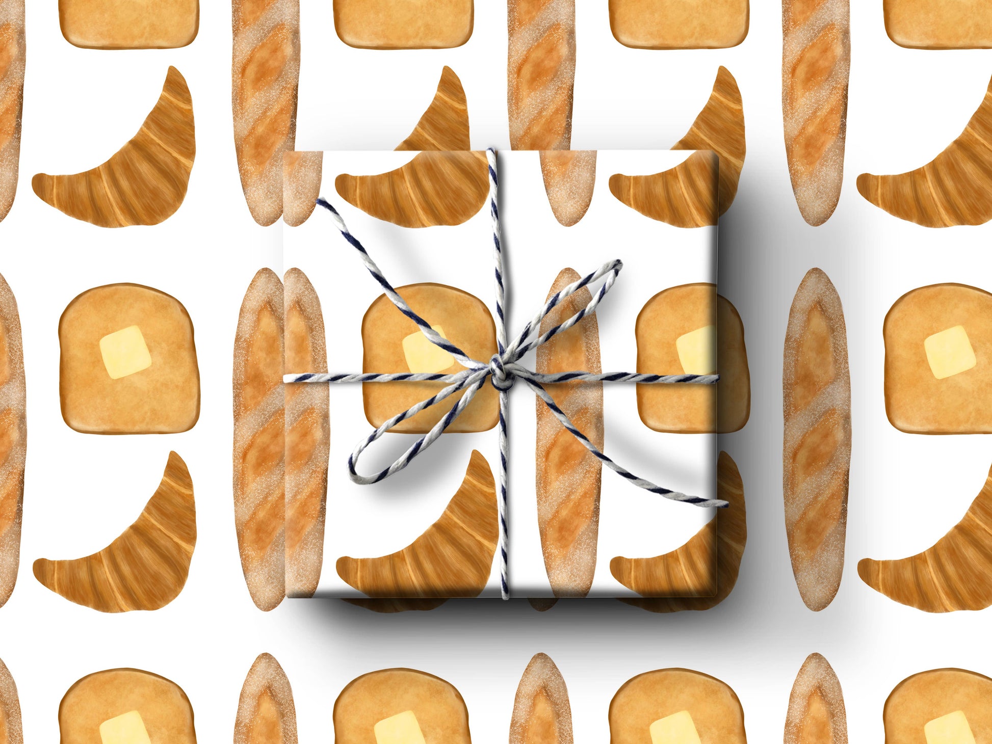 Bread gift wrap includes toast with butter, baguttes, and croissants.