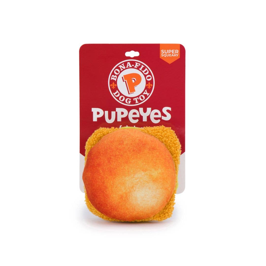 Dog toy that looks like a "Pupeyes" fried chicken sandwich.