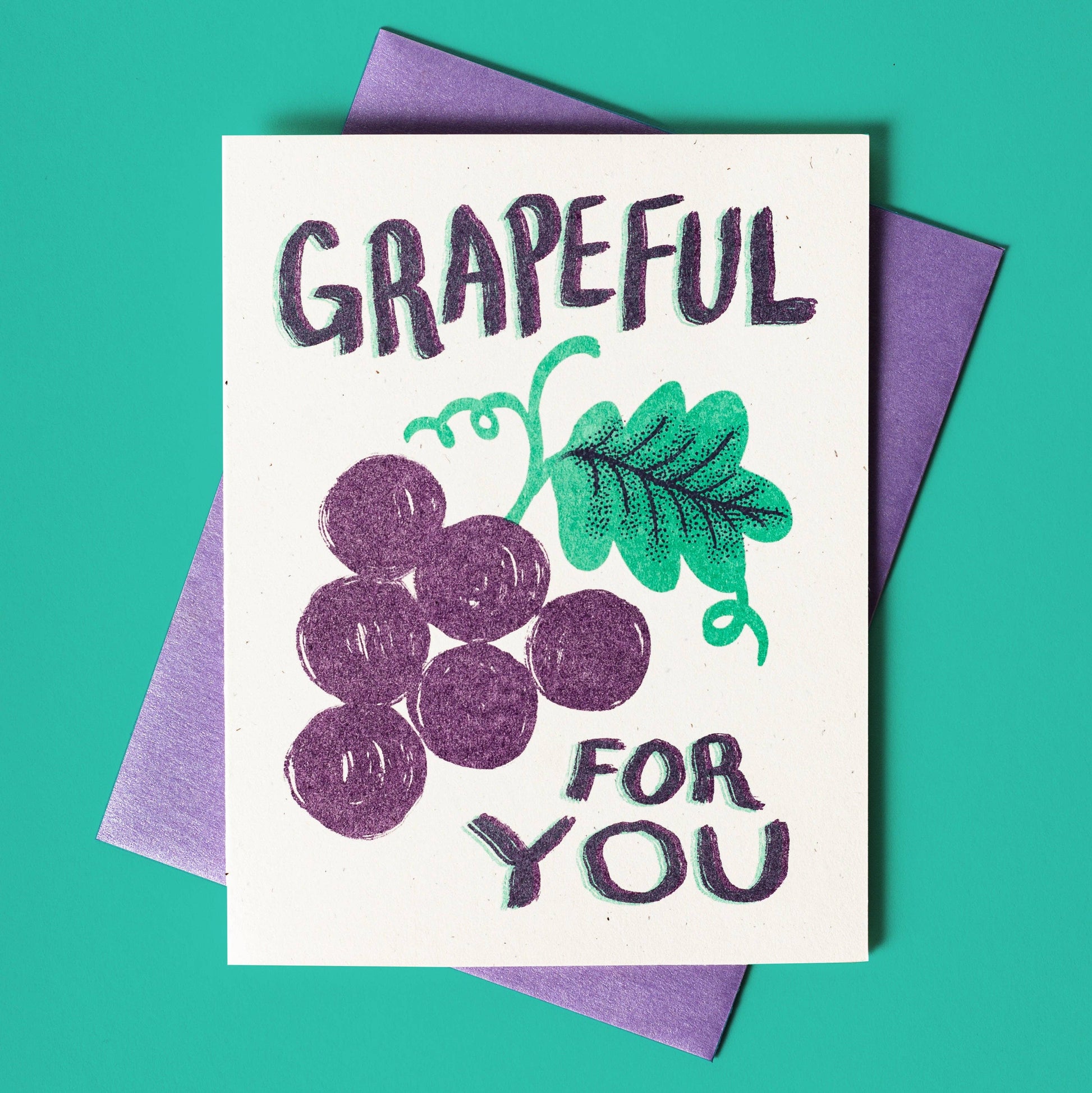 Greeting card with grapes on it that reads "Grapeful For You" 