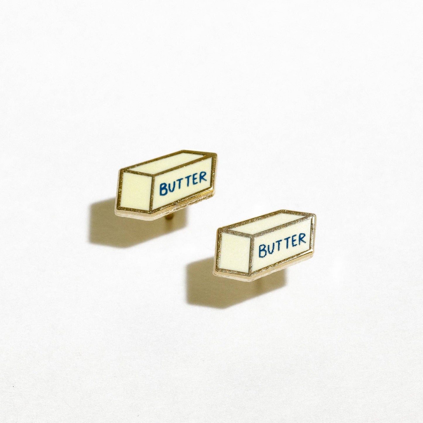gold plated and brass stick of butter stud earrings 
