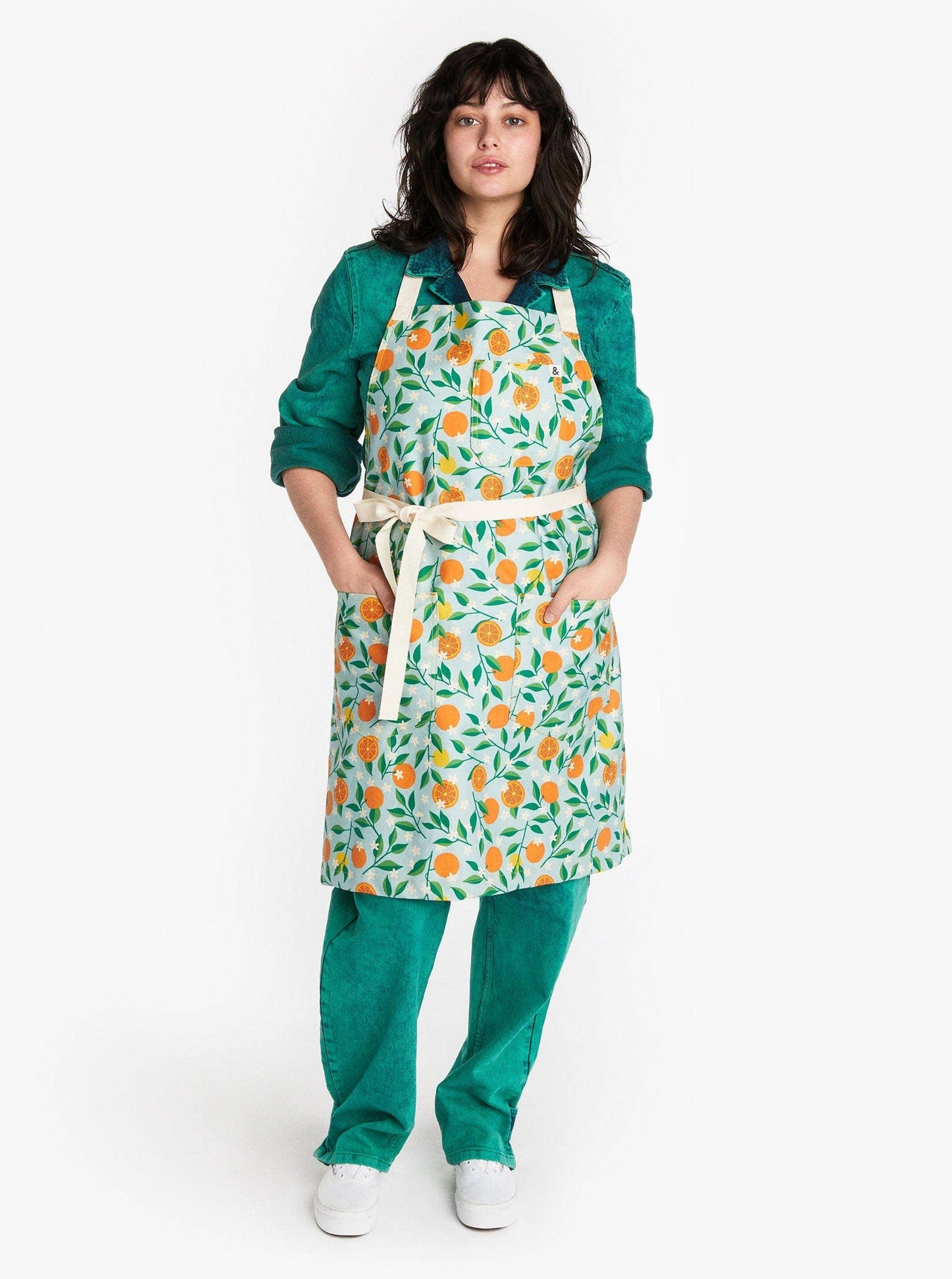 Adult size apron -- light blue background with orange + leaf print and cream neck loop + tie 