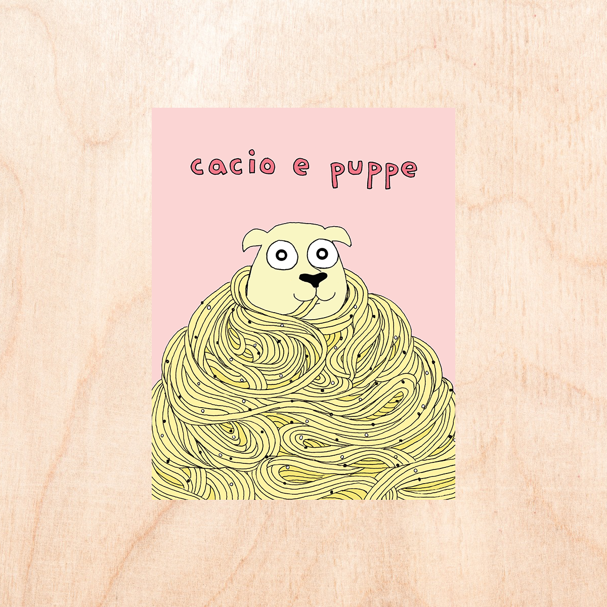 Pink greeting card that reads "cacio e puppe" and has a dog in a pile of cacio e pepe with noodles in his mouth 