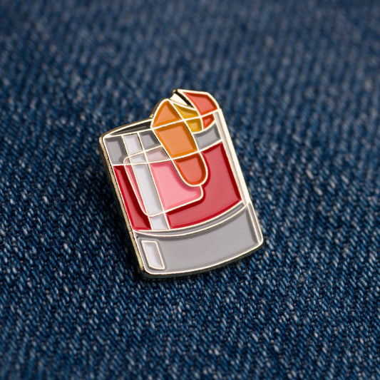 Negroni cocktail enamel pin on denim jacket 