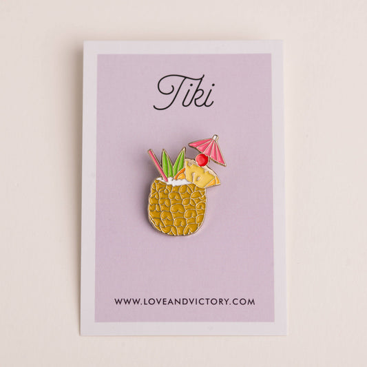 Tiki drink cocktail enamel pin on lilac card backing 
