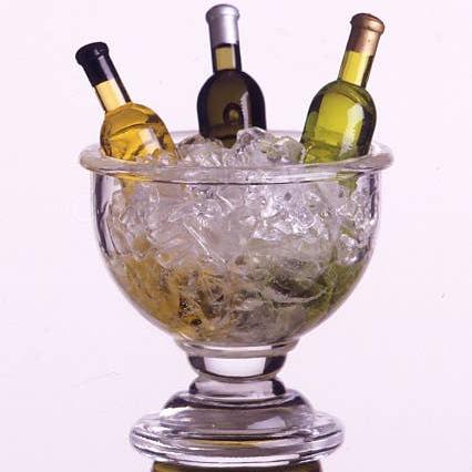 Bottle stopper designed with an acrylic wine bowl filled with ice and 3 wine bottles in it. 