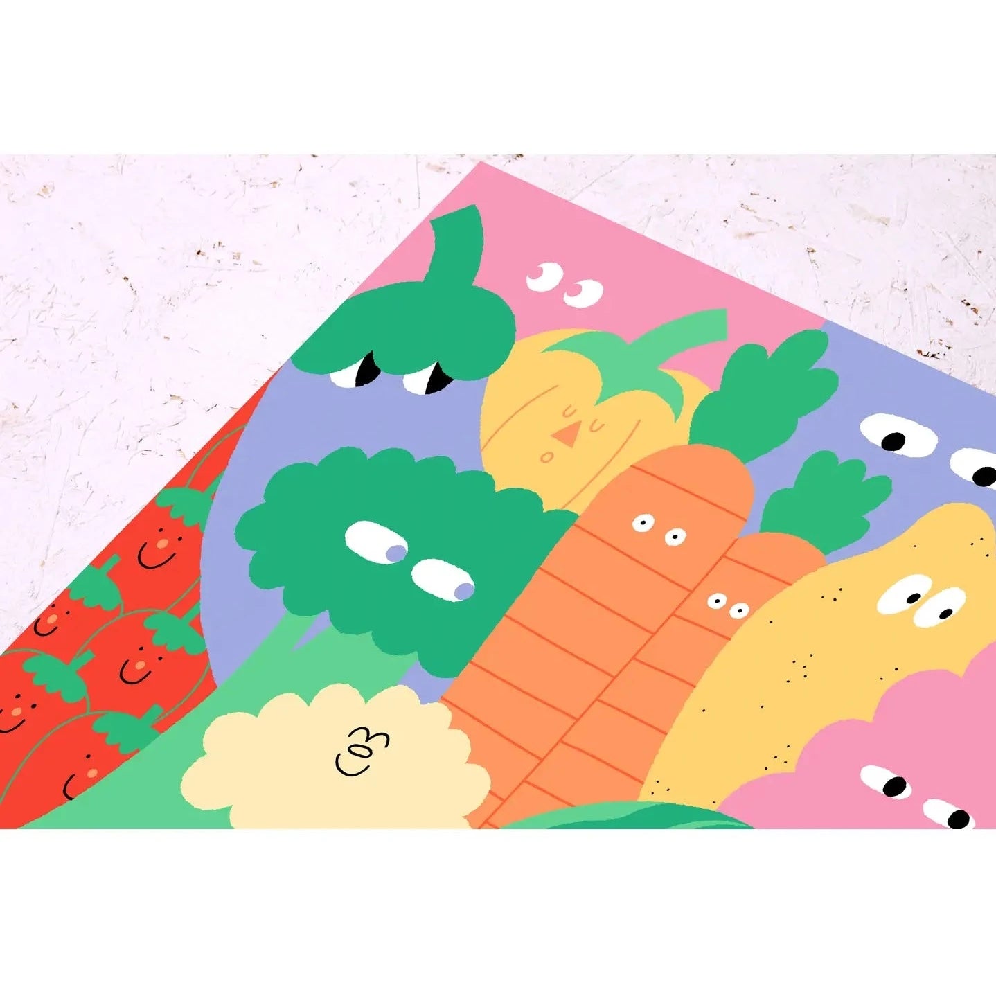 wrapping paper with different veggies with faces on it 