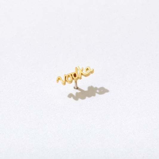 Single 14k gold plated stud earring -- reads "vodka" in handwritten script