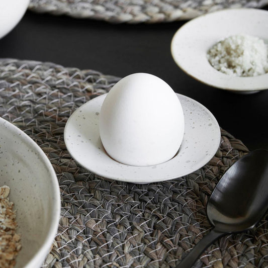 speckled white egg cup/saucer 